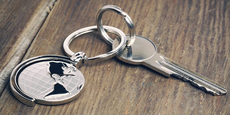 A globe keyring attached to a key